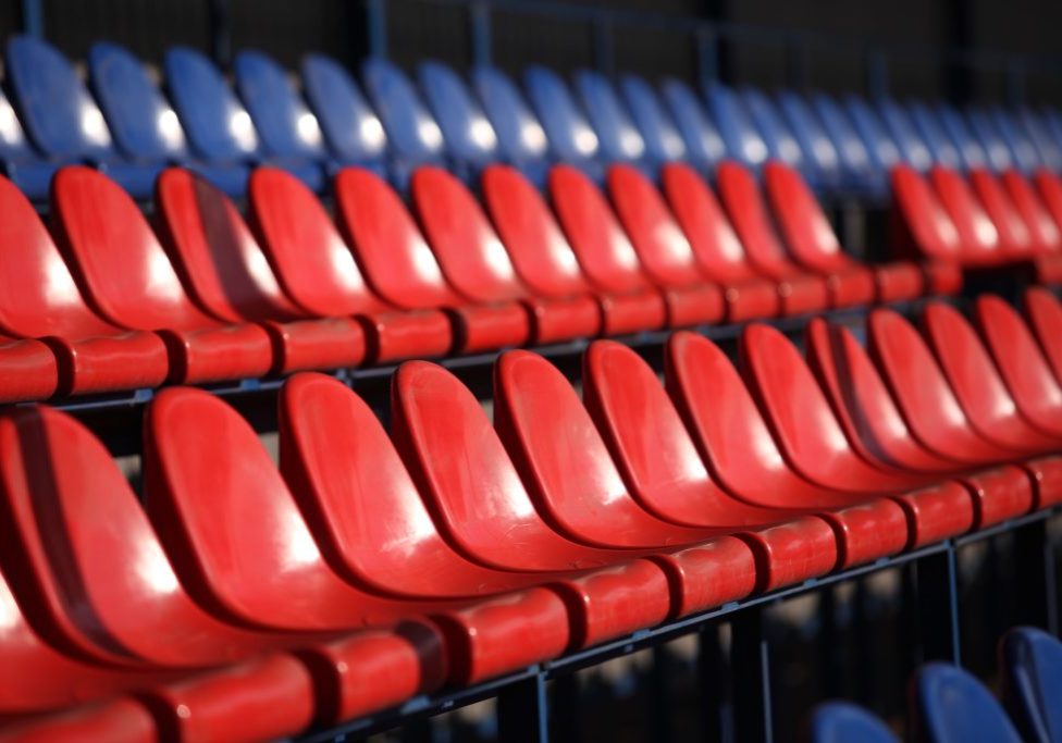 54904835 - red chairs bleachers in stadium close to 54904835 - red chairs bleachers in stadium close to