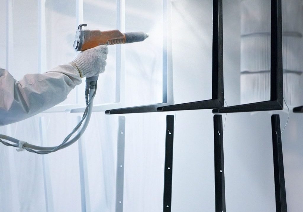 12246351 - hand holding powder coating sprayer 12246351 - hand holding powder coating sprayer