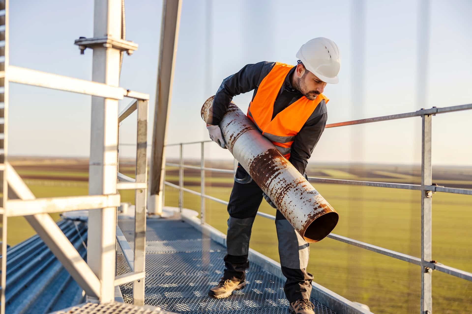 worker using rolled steel