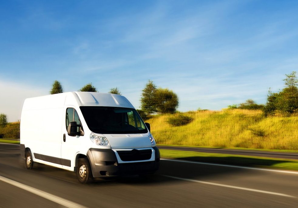 White delivery van on the road Roller Die Helps the Logistics Industry Grow