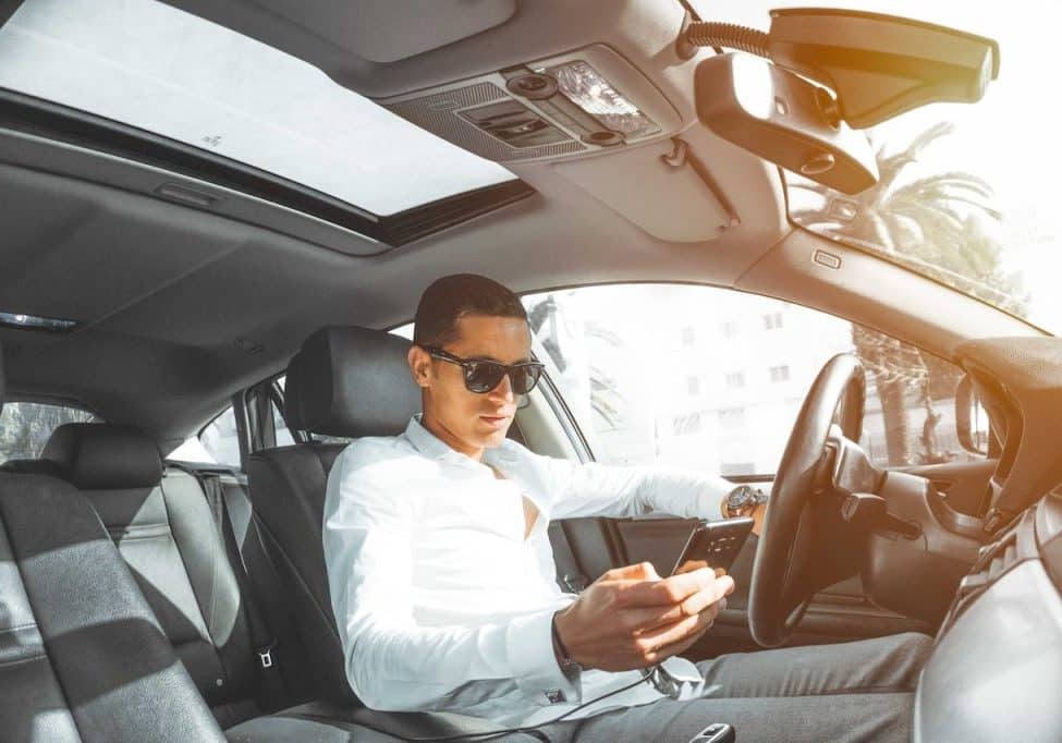pexels-hassan-ouajbir-804128 man driving a car